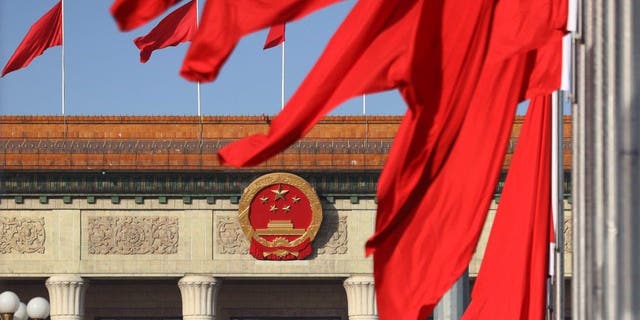 Chinese national flags flutter at Tian'anmen Square ahead of the annual two sessions on March 3, 2023, in Beijing. 