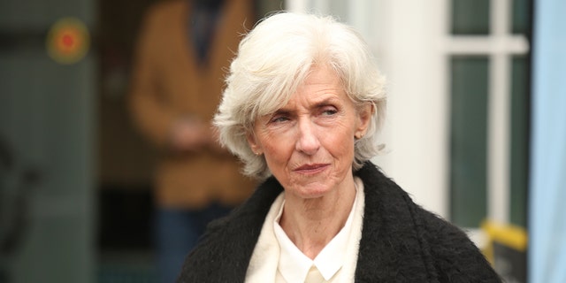 Kristin Vik, the mother of murdered Norwegian student Martine Vik Magnussen arrives to lay a wreath outside Regent's University on March 14, 2022. Her daughter's alleged killer reportedly admitted involvement.
