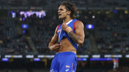 Jamarra Ugle-Hagan points to his skin as he celebrates a goal on March 30, 2023, in Melbourne, Australia. 