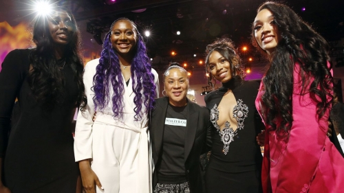 South Carolina head coach Dawn Staley (middle) saw five of her players drafted.