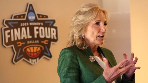 Jill Biden talks with guests during the 2023 NCAA women's basketball tournament national championship.