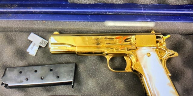 Gold-plated handgun