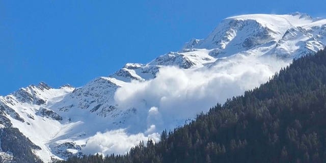 In this photo provided by Contamines Montjoie, an avalanche rolling down the Armancette glacier in Contamines-Montjoie, France, in the Haute-Savoie region, almost 20 miles southwest of Chamonix, on April 9, 2023.