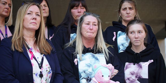 Cheryl Korbel, mother of 9-year-old homicide victim Olivia Pratt-Korbel, stands outside Englands Manchester Crown Court, where killer Thomas Cashman was sentenced Monday to life in prison.