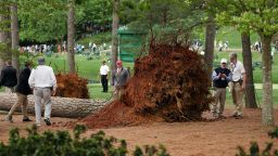 AUGUSTA, GEORGIA - APRIL 07: Course officials look over fallen trees on the 17th hole during the second round of the 2023 Masters Tournament at Augusta National Golf Club on April 07, 2023 in Augusta, Georgia. (Photo by Patrick Smith/Getty Images)