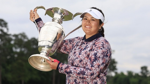 Lilia Vu celebrates with the trophy after winning The 2023 Chevron Championship at Carlton Woods in The Woodlands, Texas.