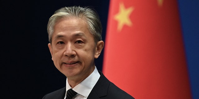 Chinese Foreign Ministry spokesman Wang Wenbin answers a question during a press conference at the Ministry of Foreign Affairs in Beijing on August 8, 2022.