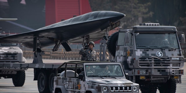 A drone seen during a parade on the 70th Anniversary of the founding of the People's Republic of China at Tiananmen Square in 2019. A leaked U.S. assessment reveals Chinese military is preparing a supersonic spy drone unit.