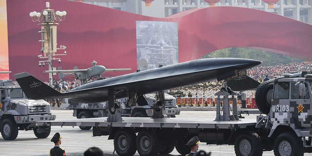 A military vehicle carrying a WZ-8 supersonic reconnaissance drone takes part a military parade at Tiananmen Square in Beijing on October 1, 2019, to mark the 70th anniversary of the founding of the Peoples Republic of China.