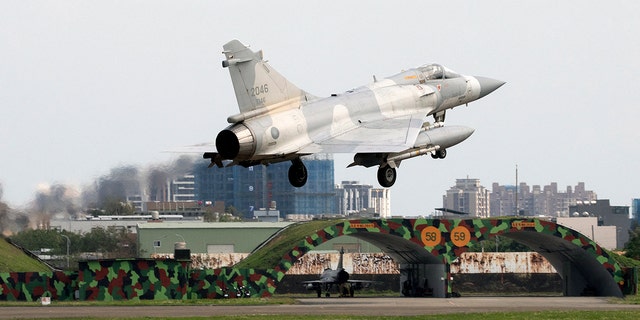 A Taiwanese air force Mirage 2000 fighter jet lands at an air force base in Hsinchu, northern Taiwan on April 9, 2023. 