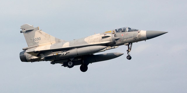 A Taiwanese air force Mirage 2000 fighter jet is seen on final approach for landing at an air force base in Hsinchu, northern Taiwan on April 9, 2023. 