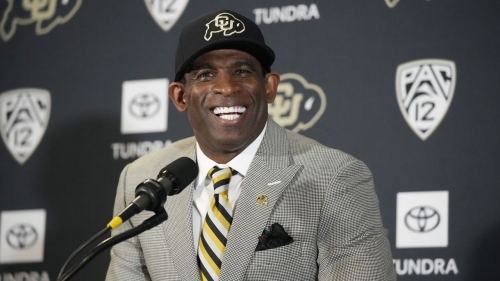 Deion Sanders speaks after being introduced as the new head football coach at the University of Colorado in December. 