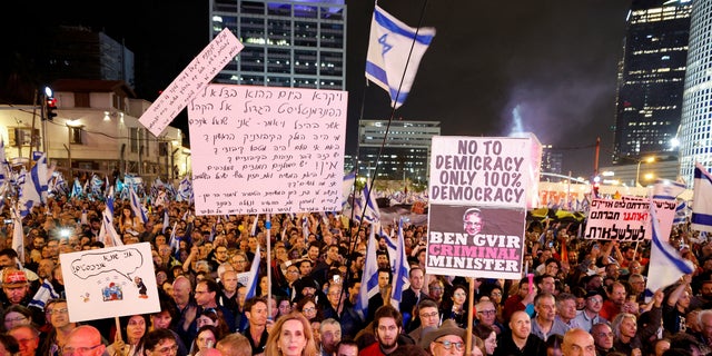 People attend a demonstration against Israeli Prime Minister Benjamin Netanyahu's judicial overhaul, in Tel Aviv, Israel March 25, 2023.
