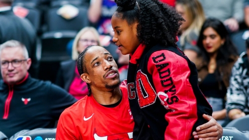 DeMar DeRozan embraces his daughter Diar before the game against the Toronto Raptors