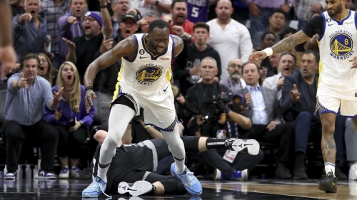 Draymond Green moves away from Domantas Sabonis in the second half of Game 2 between the Golden State Warriors and Sacramento Kings.
