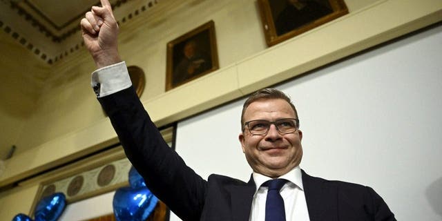 The National Coalition party Chairman Petteri Orpo celebrates with supporters at the party's parliament election party at the Ostrobotnia club in Helsinki, Finland on Sunday, April 2, 2023.