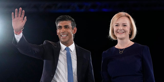 Liz Truss and Rishi Sunak on stage after a Conservative leadership election hustings at Wembley Arena in London, Aug. 31, 2022.