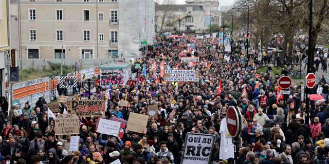 Demonstrators march on April 6, 2023 in Nantes, France. Thousands of people are expected to fill the streets of France on Thursday for the 11th day of nationwide resistance to a government proposal to raise the country's retirement age.
