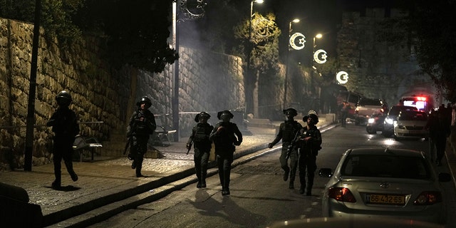 Israeli police patrolled Jerusalem as protesters attempted to barricade themselves into the Al-Aqsa Mosque overnight.