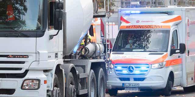 A concrete mixer vehicle stands on a road where a cyclist was critically injured in a traffic accident with a truck in Berlin, Germany, on Oct. 31, 2022. German prosecutors determined that climate protesters weren't responsible in the death of the cyclist.