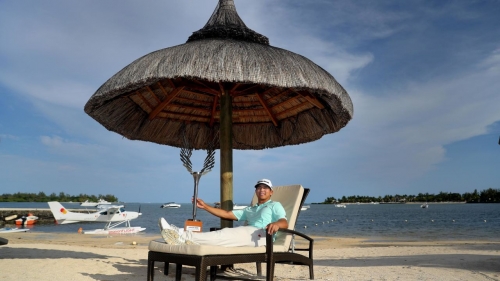 Kitayama toasts his Mauritius Open victory at the Four Seasons Golf Club in December 2018.