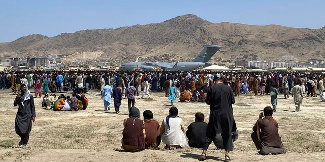 people gathered at airport in Kabul, Afghanistan