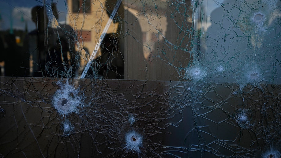 Israeli shopping center glass is broken after rocket fire from Lebanon