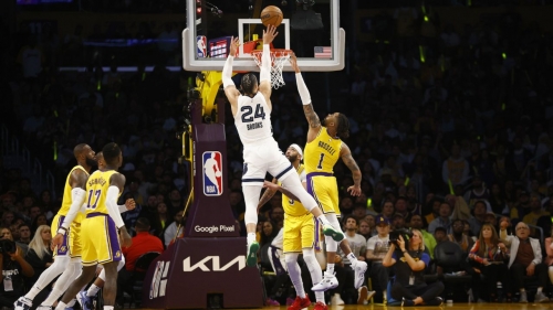 
Dillon Brooks of the Memphis Grizzlies takes a shot against D'Angelo Russell of the Los Angeles Lakers. 