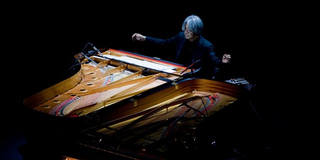 FILE - Maestro Ryuichi Sakamoto performs at Rome's Auditorium, Wednesday, Oct. 28, 2009.  Japan's recording company Avex says Sakamoto, a musician who scored for Hollywood movies such as "The Last Emperor" and "The Revenant," has died. He was 71. He died March 28, according to the statement released Sunday, April 2, 2023.