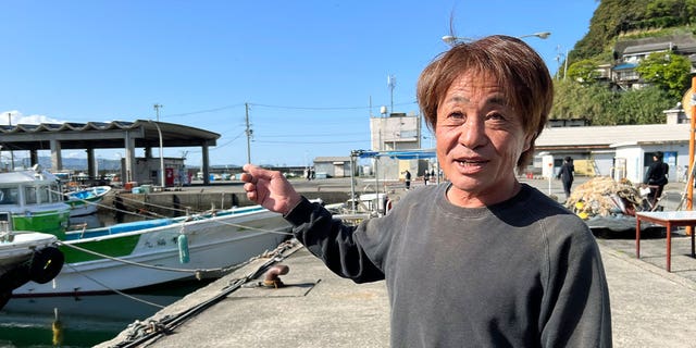 Masaki Nishide, a fisherman at the Saikazaki port, describes an explosive scene on April 16, 2023, where Prime Minister Fumio Kishida narrowly escaped a smoke bomb attack in Wakayma, western Japan.
