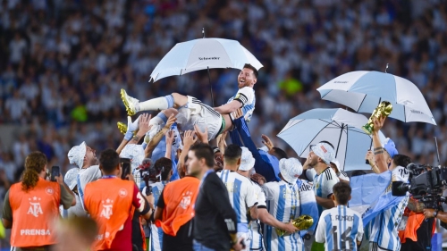 Lionel Messi is hoisted aloft by his Argentina teammates as they celebrate the World Cup win.