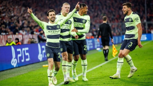 Manchester City players celebrate after talking the lead against Bayern Munich. 