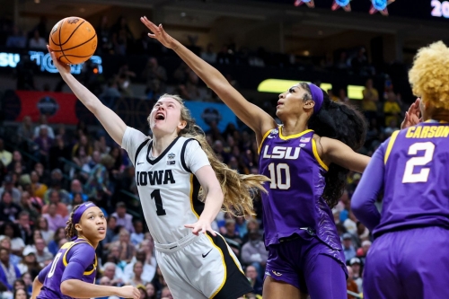 Iowa's Molly Davis is defended by Reese in the second half.