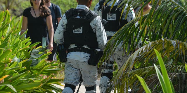 Mexican authorities have heavy security in Cancun to protect tourists.