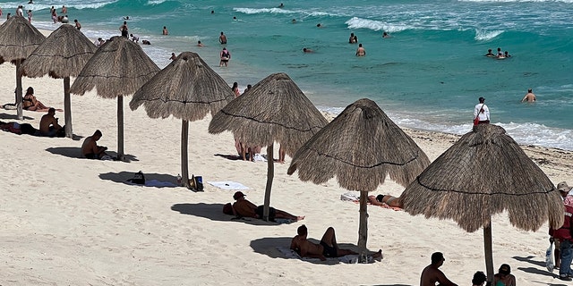 A photo of people at the beach