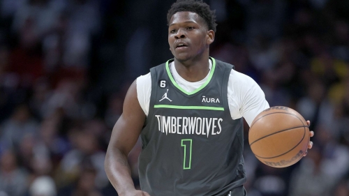 Anthony Edwards of the Minnesota Timberwolves brings the ball down the court against the Denver Nuggets in the NBA Playoffs at Ball Arena on Tuesday in Denver. 