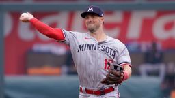 KANSAS CITY, MISSOURI - MARCH 30: Kyle Farmer #12 of the Minnesota Twins in action against the Kansas City Royals on Opening Day at Kauffman Stadium on March 30, 2023 in Kansas City, Missouri. (Photo by Ed Zurga/Getty Images)