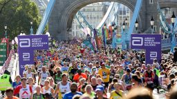 Mandatory Credit: Photo by Dinendra Haria/LNP/Shutterstock (13435473ad)
London Marathon runners crossing Tower Bridge, in central London, as runners reach the half way point. Nearly 42 thousand runners are running alongside elite runners competing for a race in TCS 2022 London Marathon.
TCS 2022 London Marathon, London, UK - 02 Oct 2022