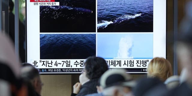 A TV screen shows a recent combination of images released by Pyongyang's official Korean Central News Agency during a news program at the Seoul Railway Station in Seoul, South Korea, Saturday, April 8, 2023. North Korea on Saturday claimed it tested this week a second known type of nuclear-capable underwater attack drone designed to destroy naval vessels and ports, adding to a flurry of weapons demonstrations this year that have heightened tensions with rivals.