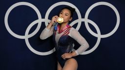 Sunisa Lee, of United States, reacts as she poses for a picture after winning the gold medal in the artistic gymnastics women's all-around final at the 2020 Summer Olympics, Thursday, July 29, 2021, in Tokyo, Japan. (AP Photo/Gregory Bull)