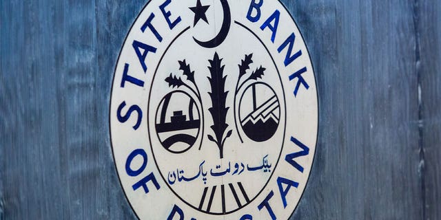 The emblem of the State Bank of Pakistan is seen on Jan. 23, 2023. The State Bank said Pakistanis living abroad sent 27.4% more cash back home in March than in February. 