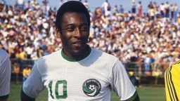 (Original Caption) Miami, Florida: Head and shoulders portrait of the New York Cosmos soccer sensation Pele standing on the field in New York Cosmos uniform. The crowd can be seen in the background.
