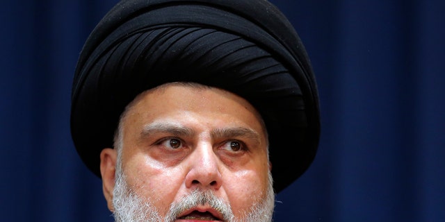 Influential Shiite cleric Muqtada al-Sadr makes a speech from his house in Najaf, Iraq, Tuesday, Aug. 30, 2022.