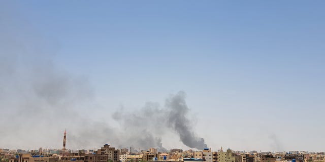 Smokes rise after clashes erupted in the Sudanese capital of Khartoum on April 15, 2023 between the Sudanese Armed Forces and the paramilitary Rapid Support Forces.