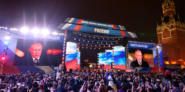 Russian President Vladimir Putin speaks during celebrations marking the incorporation of regions of Ukraine to join Russia in Red Square with the Spasskaya Tower on the right, in Moscow Sept. 30, 2022.