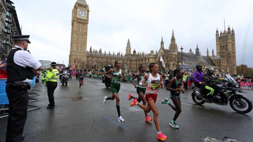 Hassan (center left) passes Big Ben on her way to an unexpected victory in London. 