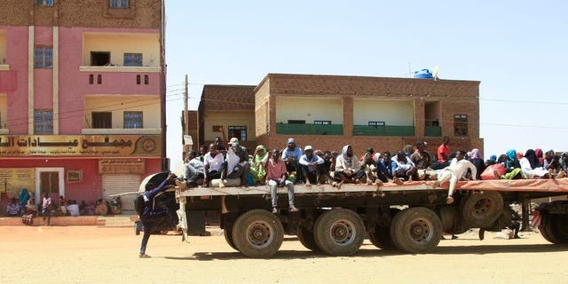 Sudanese people fleeing conflict
