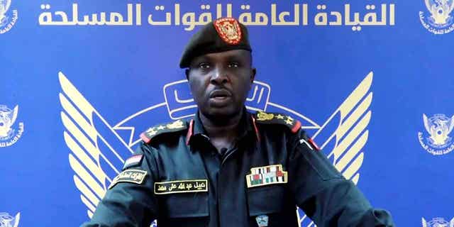 Sudanese Armed Forces spokesman Brig. Nabil Abdullah reads a statement warning of conflict after the recent deployment of powerful paramilitary forces in the country's capital and other cities. Tensions between the military and the paramilitary have escalated in recent months.