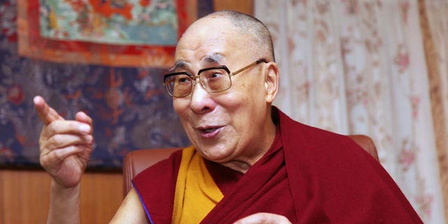 The Dalai Lama is facing criticism for asking a young boy to "suck my tongue," something his defenders say was meant as a joke.