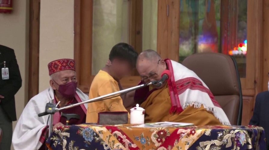 Dalai Lama apologizes for 'hug' with young boy